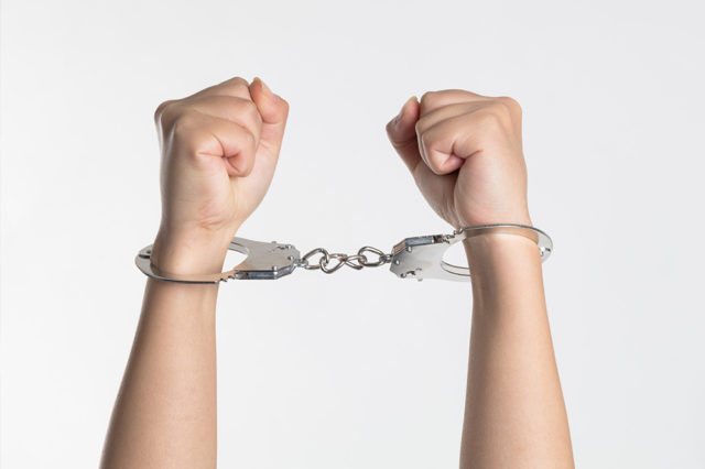 criminal in handcuffs